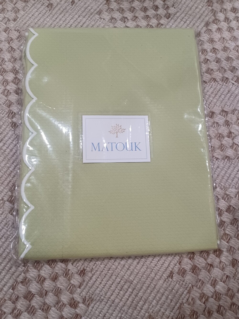 Pair of Matouk Moss Pique King Scalloped Shams.